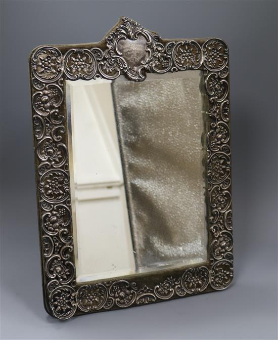 An Edwardian repousse silver mounted easel mirror by Walker & Hall, Sheffield, 1902, overall 40.2cm.